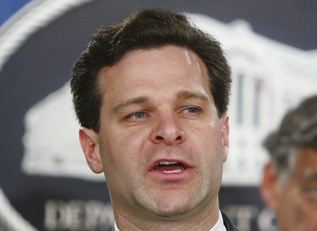 Assistant Attorney General Christopher Wray, speaks in 2003 at a news conference at the Justice Department in Washington.  President Donald Trump says he'll nominate Wray, a former Justice Department official, to be FBI director. (AP Photo/Ron Edmonds)