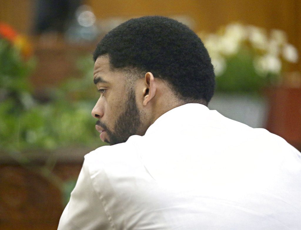 Dominique Heaggan-Brown listens to the statement he made to investigators after the shooting is read back to him in court by Special Agent Raymond Gibbs of the Wisconsin Department of Justice, Friday, June 16, 2017, in Milwaukee. Heaggan-Brown, a former Milwaukee police officer on trial in a fatal shooting that sparked riots in a predominantly black neighborhood, said Friday he will not testify, as his attorneys prepare to begin presenting his defense. (Michael Sears/Milwaukee Journal Sentinel via AP, Pool)
