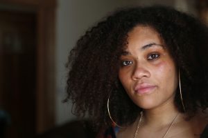 Arminta Jeffryes poses for a picture in her home in Newark, N.J., Thursday, June 22, 2017. Jeffryes was arrested while protesting police brutality. Then the police department played an unusual role in her court case. A New York Police Department lawyer stepped in to prosecute the jaywalking charge against her, in a low-level court that usually has no prosecutors at all. Jeffryes’ lawyer says the police attorney wouldn’t agree to a dismissal unless Jeffryes said her arrest was legitimate, which she contests. (AP Photo/Seth Wenig)