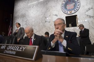 Senate Judiciary Committee Chairman Sen. Chuck Grassley, R-Iowa, joined at left by Sen. Orrin Hatch, R-Utah, leads a hearing on Capitol Hill in Washington, Wednesday, July 26, 2017, on attempts to influence American elections, with a focus on Russian meddling in the last presidential race. (AP Photo/J. Scott Applewhite)