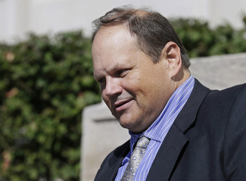 FILE - In this Sept. 9, 2015, file photo, former Multi-State Lottery Association security director Eddie Tipton leaves the Polk County Courthouse in Des Moines, Iowa. Tipton, who admitted to masterminding a scheme to rig lottery games that paid him and others $2 million from seven fixed jackpots in five states, is scheduled to be sentenced Tuesday, Aug. 22, 2017. (AP Photo/Charlie Neibergall, File)
