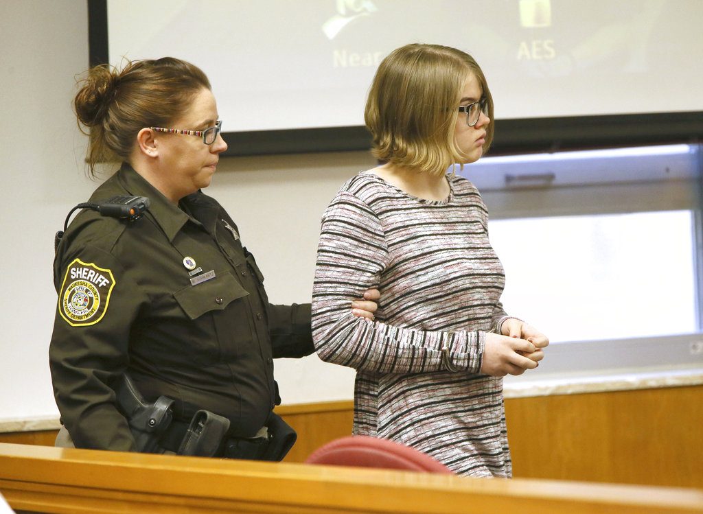 FILE - In this Nov. 11, 2016 file photo, Morgan E. Geyser is escorted into a Waukesha County Court in Waukesha, Wis. Geyser, one of two Wisconsin girls charged with stabbing a classmate to impress the fictitious horror character Slender Man will plead guilty in a deal that calls for her to avoid prison time, attorneys announced Friday, Sept. 29, 2017. Geyser will remain in a state mental hospital under an agreement announced in a court hearing two weeks before her trial was set to start. (Michael Sears/Milwaukee Journal-Sentinel via AP, Pool,File)