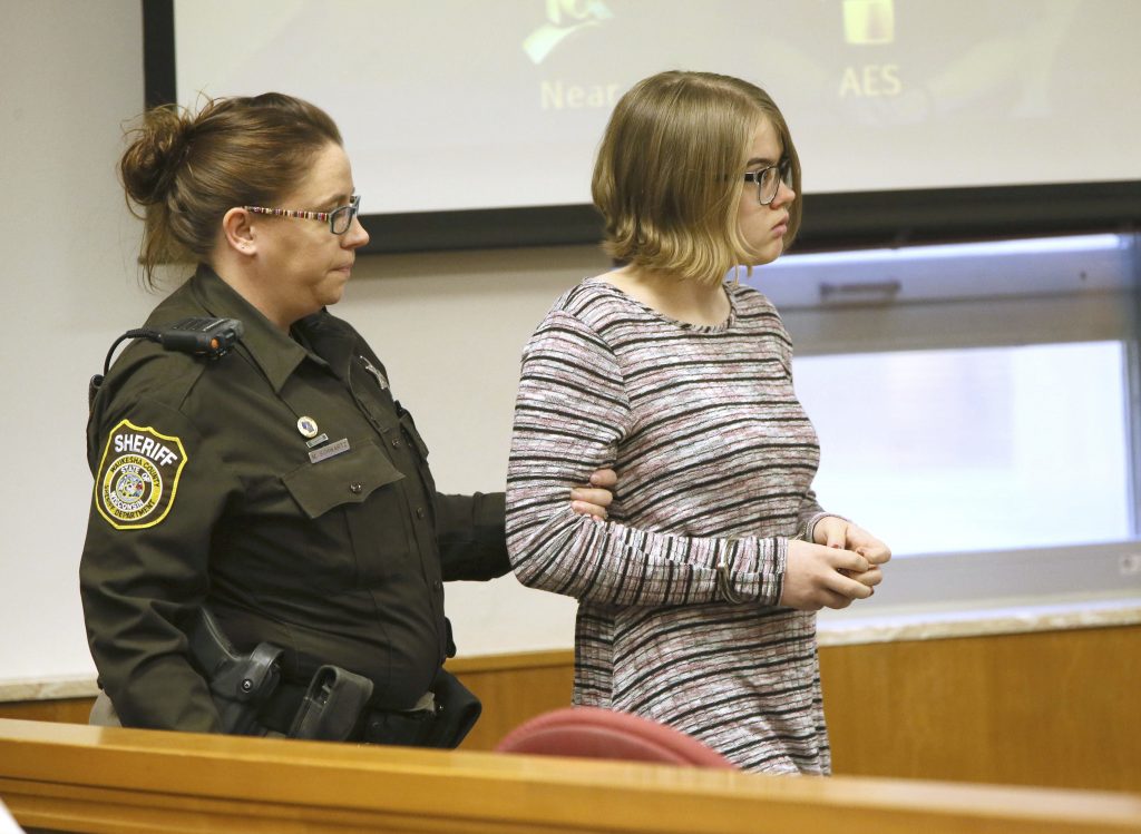 Morgan E. Geyser is escorted into a Waukesha County Court in Waukesha in November. Geyser, one of two Wisconsin girls charged with stabbing a classmate to impress the fictional horror character Slender Man, will plead guilty in a deal that calls for her to avoid prison time. Geyser will remain in a state mental hospital under an agreement announced in a court hearing two weeks before her trial was to start. (Michael Sears/Milwaukee Journal-Sentinel via AP, Pool,File)