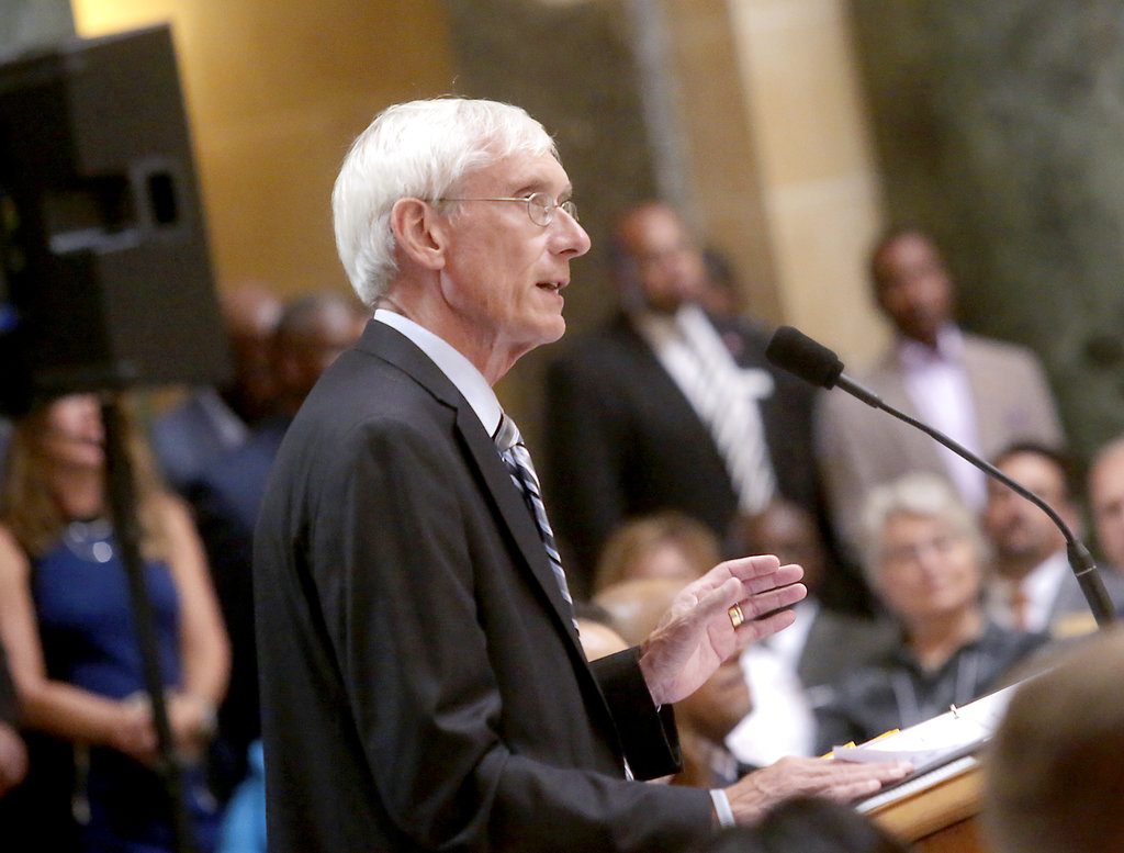 FILE - In this Sept. 21, 2017 file photo, Wisconsin state schools superintendent Tony Evers speaks in the rotunda of the Wisconsin State Capitol in Madison, Wis. Evers detailed his reasoning for refusing to be represented by the Republican-led state Department of Justice in a lawsuit filed by a conservative law firm targeting his rule-making powers on Tuesday, Nov. 28, 2017, in Madison. (John Hart /Wisconsin State Journal via AP, File)