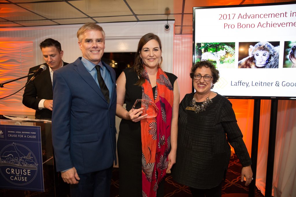 Flanked by Animal Legal Defense Fund Founder Joyce Tischler, left, and Director Stephen Wells, right, Jessica Farley of Laffey, Leitner & Goode accepts the 2017 Advancement in Animal Law Pro Bono Achievement Award on Nov. 5 at the Animal Legal Defense Fund’s Cruise for a Cause event in Los Angeles. (Submitted by Animal Legal Defense Fund)