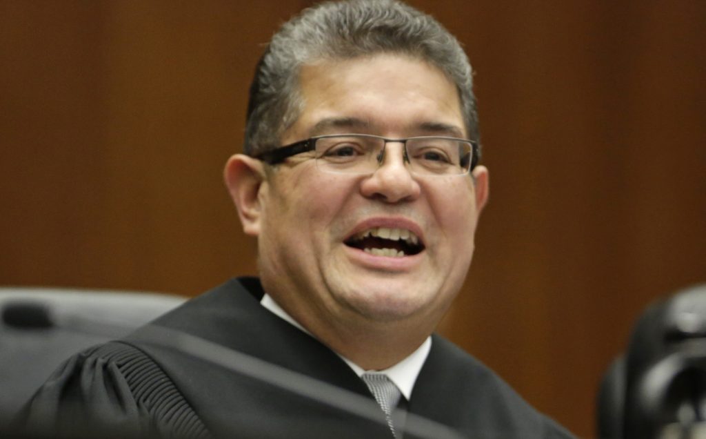 Chief U.S. District Judge Ruben Castillo speaks Nov. 25, 2013, from the bench in Chicago. A rare panel of federal trial judges including Castillo on Thursday started two days of hearings on whether federal agents display racial bias by staging phony stash-house stings overwhelmingly in black neighborhoods. AP File Photo by M. Spencer Green