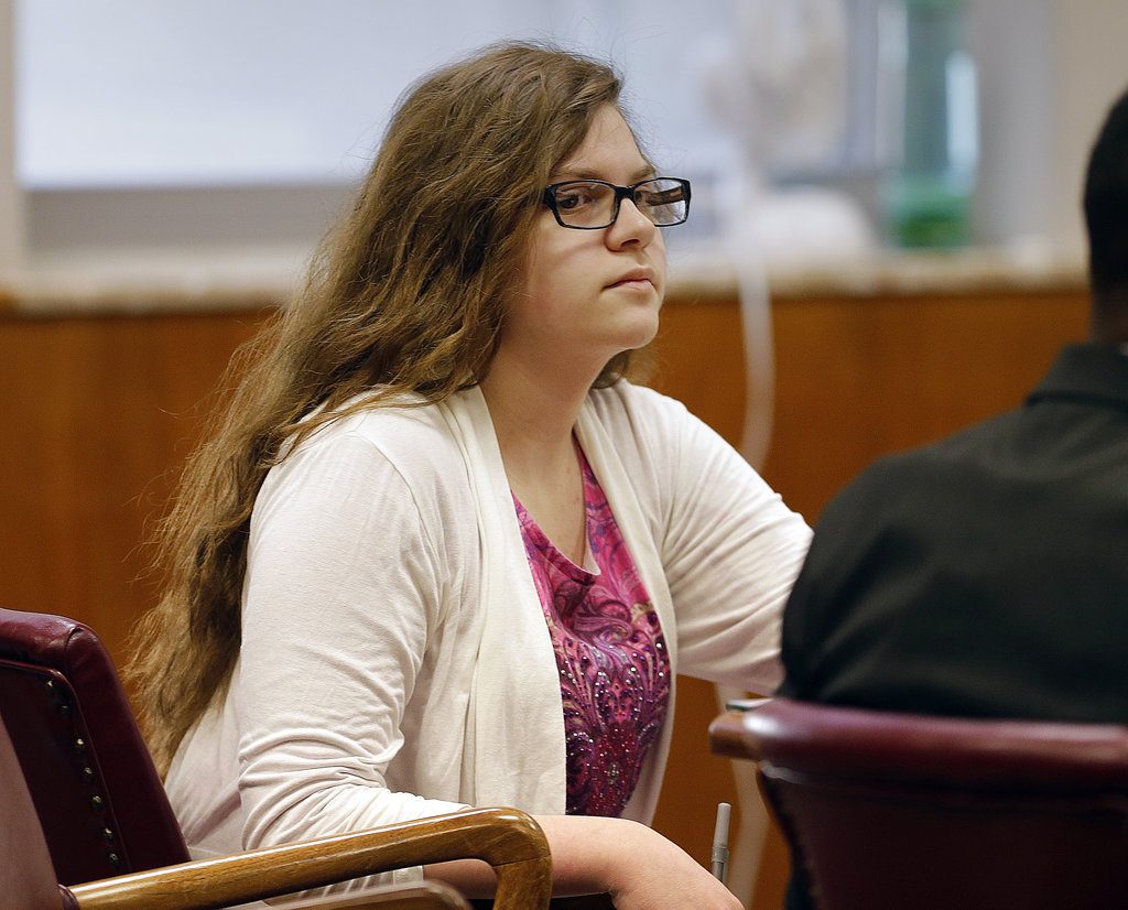 FILE - In this Sept. 13, 2017 file photo, Anissa Weier, listens as former teachers testify during her trial in Waukesha County Court, in Waukesha, Wis. One of the two Wisconsin girls accused of stabbing a classmate, Payton Leuter, in 2014 to gain the favor of a horror character named Slender Man will soon learn how long she will spend in a mental health facility. A judge in Waukesha County Circuit Court on Thursday, Dec. 21, 2017, is expected to send 16-year-old Weier to a facility for at least three years after she was previously found not guilty by reason of mental disease or defect. (Rick Wood/Milwaukee Journal-Sentinel via AP, Pool, File)