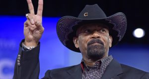 FILE - In this Feb. 23, 2017, file photo, Milwaukee County Sheriff David Clarke speaks at the Conservative Political Action Conference (CPAC) in Oxon Hill, Md. The former Milwaukee Sheriff’s run-in with a man who shook his head at him while boarding a flight last year is headed for trial in federal court Monday, Jan. 22, 2018. (AP Photo/Susan Walsh File)