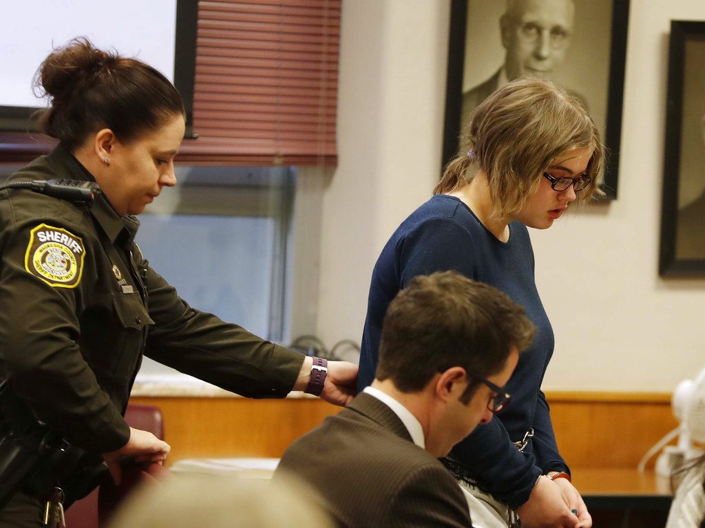 Morgan Geyser, 15,  appears for sentencing before Waukesha County Circuit Judge Michael Bohren, Thursday, Feb. 1, 2018 in Waukesha, Wis.   Geyser is one of two girls who tried to kill a classmate with a knife to appease fictional horror character Slender Man.  Prosecutors want Geyser to spend the maximum 40 years in a mental hospital for stabbing Payton Leutner in suburban Milwaukee in 2014.  (Rick Wood/Milwaukee Journal-Sentinel via AP, Pool)