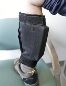 The Band-It fastens to the lower leg of a defendant by Velcro fasteners and a zipper. It fits under the pant leg and is used in Rock County on jail inmates during jury trials. (Anthony Wahl /The Janesville Gazette via AP)