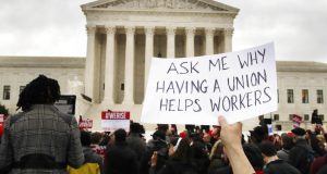 The Supreme Court, shown Monday, Feb. 26, 2018, in Washington, takes up a challenge in a case that could deal a painful financial blow to organized labor. The court is considering a challenge to an Illinois law that allows unions representing government employees to collect fees from workers who choose not to join.(AP Photo/Jacquelyn Martin)