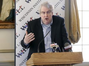 Marquette University Professor John McAdams, right, speaks in May 2016 at a news conference in Milwaukee.  A dispute between the conservative professor and the university, which fired him, will go before the Wisconsin Supreme Court to decide whether the teacher’s termination was because of a blog post or his conduct. Former Marquette University professor McAdams says in a lawsuit he was fired for exercising his freedom of speech by criticizing what he saw as an instructor's decision to shut down a discussion against gay marriage.  (Mike De Sisti/Milwaukee Journal-Sentinel via AP)