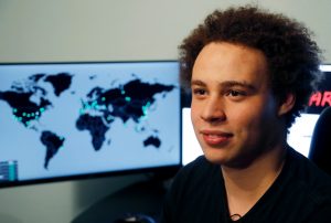 Marcus Hutchins, a British cybersecurity expert, talks during an interview in Ilfracombe, England. Hutchins, who was once hailed as a hero for stopping the WannaCry computer virus that crippled computers worldwide, faces charges alleging he distributed a malicious software called Kronos to steal banking passwords from unsuspecting computer users. Hutchins pleaded not guilty to the charges in August. (AP Photo/Frank Augstein, File)