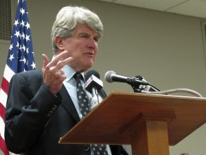 Matt Flynn, a retired lawyer out of Milwaukee and former Wisconsin Democratic Party chairman announces his candidacy for governor in Madison in October. Flynn plans to submit the required signatures to get on the ballot for governor as a Democrat on Wednesday,, even as pressure mounts over his past work defending the Milwaukee Archdiocese against priest-abuse victims. (AP Photo/Scott Bauer, File)