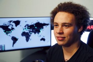 FILE - This May 15, 2017, file photo shows British cybersecurity expert Marcus Hutchins during an interview in Ilfracombe, England. Hutchins, accused of creating and distributing malware designed to steal banking passwords, is headed to court Wednesday, May 16, 2018, in Milwaukee for a hearing on what evidence may be used in the case. Federal prosecutors in Milwaukee say Hutchins acknowledged in recorded jailhouse phone calls that code he wrote wound up in malware, and they want to introduce that evidence. (AP Photo/Frank Augstein, File)