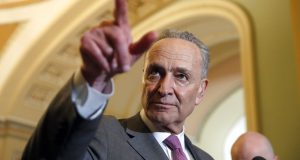 Senate Minority Leader Chuck Schumer of N.Y., points to a question during a media availability after a policy luncheon on Capitol Hill, Tuesday, May 8, 2018 in Washington. (AP Photo/Alex Brandon)