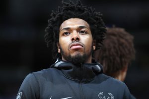 Milwaukee Bucks guard Sterling Brown is seen in April during an NBA basketball game in Denver. Brown filed a lawsuit on Tuesday, against the city of Milwaukee and its police department, alleging there was an unlawful arrest and the use of excessive force when officers used a stun gun on him during his arrest in January 2018 for a parking violation. (AP Photo/David Zalubowski, File)