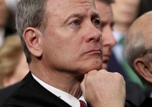 U.S. Supreme Court Chief Justice John Roberts listens as President Donald Trump delivers his first State of the Union address June 30 in the House chamber of the U.S. Capitol to a joint session of Congress in Washington. The retirement of Justice Anthony Kennedy means that the conservative Roberts probably will be the justice closest to the court’s four liberals, allowing Roberts to control where the court comes down in some of its most contentious cases. (Win McNamee/Pool via AP)