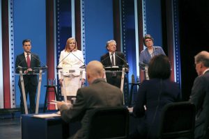Democratic candidates for Wisconsin's governor, from left, Josh Made, Kelda Helen Roys, Paul R. Soglin and Kathleen Vinehout stand on stage prior to a debate at the UWM MainStage Theatre in Milwaukee, Thursday, July 12, 2018. The event Thursday night comes as the candidates enter the final month of campaigning ahead of the Aug. 14 primary. (Michael Sears/Milwaukee Journal-Sentinel via AP)