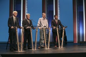 Democratic candidates for Wisconsin's governor, from left Tony Evers, Matt Flynn, Mike McCabe, and Mahlon Mitchell stand on stage prior to a debate at the UWM MainStage Theatre in Milwaukee, Thursday, July 12, 2018. The event Thursday night comes as the candidates enter the final month of campaigning ahead of the Aug. 14 primary. (Michael Sears/Milwaukee Journal-Sentinel via AP)