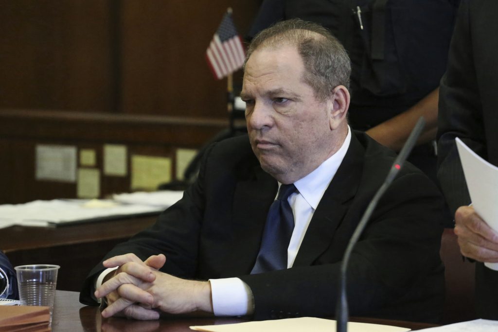 FILE - In this July 9, 2018, file photo, Harvey Weinstein attends his arraignment in court in New York. Weinstein is locked in a messy battle with insurance companies over his steadily mounting legal bills. The insurance giant Chubb and other carriers that wrote liability policies for Weinstein and his film company are arguing in court that they shouldn't have to pay for his defense against allegations of rape and sexual harassment. (Jefferson Siegel/The Daily News via AP, Pool, File)