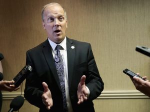 HOLD FOR STORY - FILE - In this July 29, 2016, file photo, Wisconsin Republican Attorney General Brad Schimel speaks to reporters in Madison, Wis. Schimel faces Democrat Josh Kaul in his re-election bid in the November election. (Michael P. King /Wisconsin State Journal via AP, File)