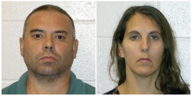 Travis Lanier Headrick, left, and Amy Michelle Headrick, were both charged on Monday with reckless endangerment, child neglect and false imprisonment. Authorities arrested them on Friday after receiving evidence that they were keeping children in makeshift cages at a home in the Village of Melvina. Authorities searched the home and found the children. (Monroe County Sheriff's Office via AP)