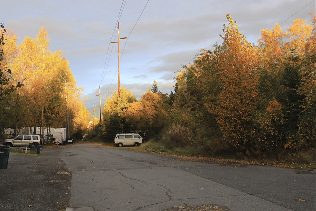 In this photo taken Monday, Sept. 24, 2018, rusting vehicles are seen along a dead-end street that was the scene of a 2017 attack of a woman in Anchorage, Alaska. Sexual violence advocates say the sentencing of defendant Justin Schneider to two years in prison with one suspended was too lenient and they're asking voters to not retain the sentencing judge in Alaska's November election. (AP Photo/Dan Joling)