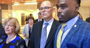 University of Wisconsin wide receiver Quintez Cephus, right, with his attorneys Kathleen Stalling, left, and Stephen Meyer after appearing in court on Thursday, Aug. 23, 2018 in Madison, Wis. Prosecutors charged Cephus on Monday with second- and third-degree sexual assault, which are both felonies. The second-degree charge carries a maximum sentence of 40 years in prison.  (Ed Treleven/Wisconsin State Journal via AP)