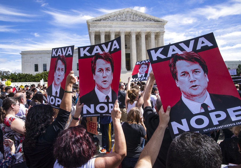 Protesters rally against Supreme Court nominee Judge Brett Kavanaugh as the Senate Judiciary Committee debates his confirmation, Friday, Sept. 28, 2018, at the Supreme Court in Washington. (AP Photo/J. Scott Applewhite)