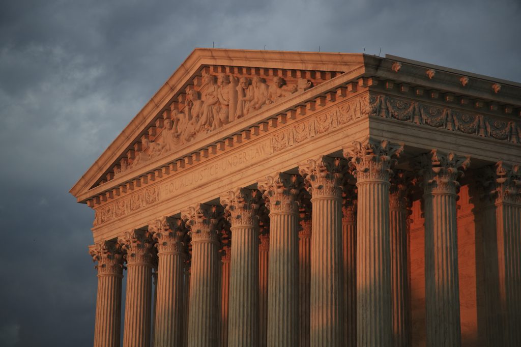 The U.S. Supreme Court is seen at sunset in Washington, Thursday, Oct. 4, 2018. (AP Photo/Manuel Balce Ceneta)