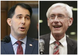 FILE - This combination of file photos shows Wisconsin Republican Gov. Scott Walker, left, and his Democratic challenger Tony Evers in the 2018 November general election. Walker, who is seeking a third term, has been working for years to repeal Obama's health care law and signed off on the state attorney general joining the lawsuit against it. But earlier this year, Walker called for a state law that would bar insurers from denying a person health coverage due to a pre-existing condition. Evers, his Democratic rival, launched an ad calling on Walker to drop his support for the lawsuit. (Wisconsin State Journal via AP, File)
