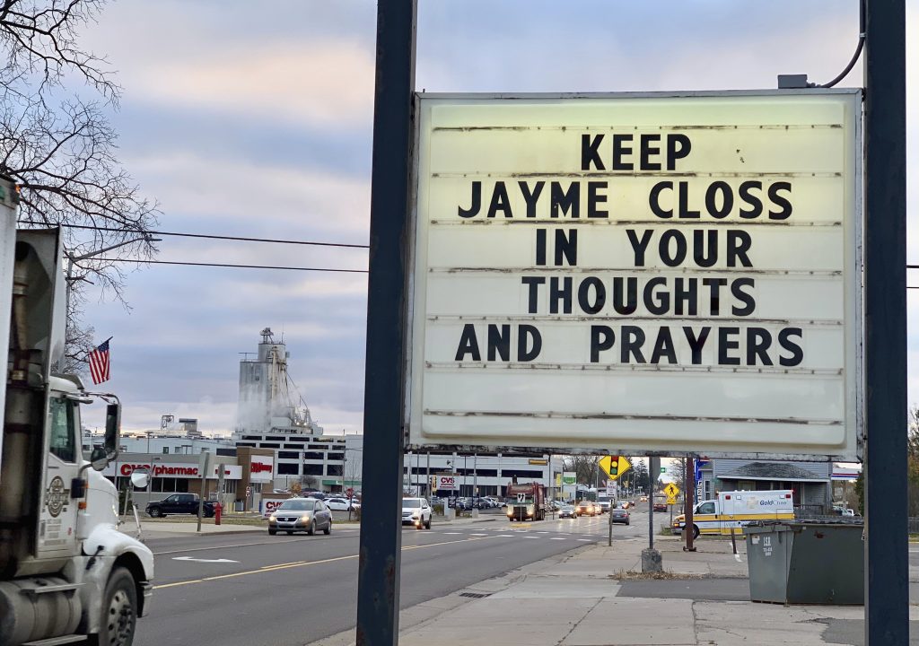 A sign is seen in the small town of Barron, Wis., Tuesday, Oct. 23, 2018, where 13-year-old Jayme Closs was discovered missing Oct. 15 after her parents were found fatally shot at their home. A search was being organized to find the couple's missing daughter. (AP Photo/Jeff Baenen)