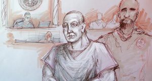In this courtroom sketch, Cesar Sayoc, left, appears in federal court, Monday, Oct. 29, 2018, in Miami. Sayoc is accused of sending pipe bombs to prominent Democrats around the country. If foreign citizens had mailed pipe bombs to prominent Democrats, or massacred Jews in a synagogue, there’s a good chance they would have been charged with terrorism. But that won’t happen with either of the men charged in the recent wave of mail bombs and the Pittsburgh shootings. That’s because there’s no domestic terrorism law. (Daniel Pontet via AP)