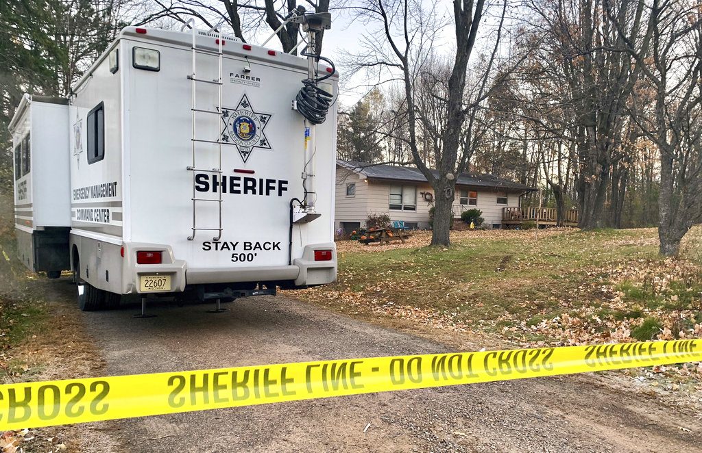 FILE - In this Oct. 23, 2018 file photo, a Barron County, Wis., sheriff's vehicle is parked outside the home where James Closs and Denise Closs were found fatally shot on Oct. 15. A search to find the couple's missing13-year-old daughter, Jayme continues. Prosecutors have charged Kyle Jaenke-Annis with burglarizing their home and felony bail jumping. According to the complaint, authorities discovered Jaenke-Annis in the Closs home early Saturday, Oct. 27, 2018,the morning of the couple's funeral.(AP Photo/Jeff Baenen File)