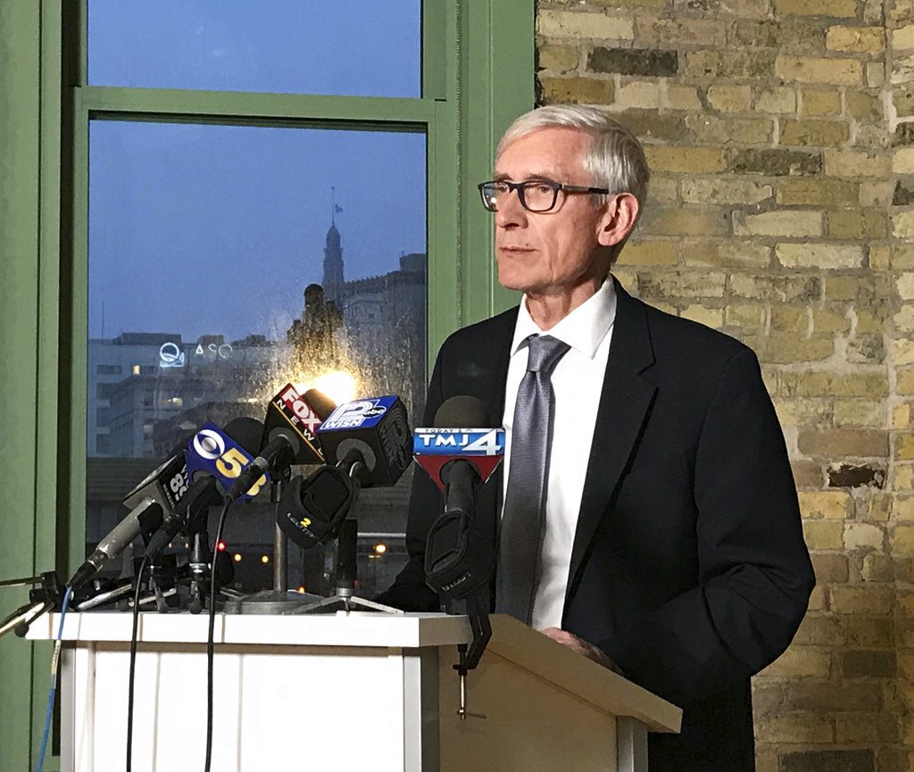 Wisconsin Gov.-elect Tony Evers speaks at the Ward 4 building in Milwaukee on Sunday, Dec. 2, 2018. Democrats in Wisconsin girded for a fight and encouraged voters to speak out as Republicans prepared to move ahead quickly this week with a highly unusual and sweeping lame-duck session to pass a series of proposals that would weaken both Democratic Gov.-elect Evers and Attorney General-elect Josh Kaul. (Meg Jones/Milwaukee Journal-Sentinel via AP)