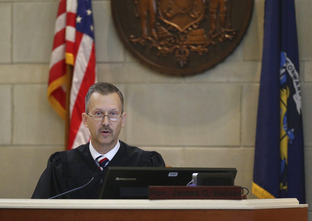 Judge James C. Babler presides in a hearing for Jake T. Patterson, charged with kidnapping 13-year-old Jayme Closs and killing her parents last fall, in Barron County Circuit Court on Wednesday, Feb. 6, 2019, in Barron, Wis. (Richard Tsong-Taatarii/Star Tribune via AP, Pool)
