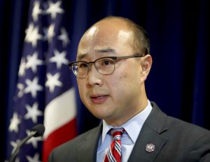 FILE--In this Nov. 2016 file photo, Ramsey County Attorney John Choi announces that Minnesota police officer Jeronimo Yanez will face three charges in the fatal shooting of Philando Castile during a July 6 traffic stop. The mother of Philando Castile and prosecutor Choi have teamed up with others to develop a tool kit for law enforcement to use in times of crisis, including police shootings. The St. Paul Pioneer Press reported the kit gives prosecutors and police ways to assess how prepared they are for police shootings, and see how they can be handled better. Among other things, the kit says a prosecutor should be immediately assigned to a police shooting and family members should be contacted within 24 hours. (David Jones/Star Tribune via AP, File)