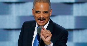 In this July 26, 2016 file photo, former Attorney General Eric Holder speaks during the second day of the Democratic National Convention in Philadelphia. Holder says he’s not running for president in 2020. In a Monday opinion piece in The Washington Post, Holder, a Democrat, says he’ll focus on redistricting, the process of reconfiguring electoral districts. (AP Photo/J. Scott Applewhite)