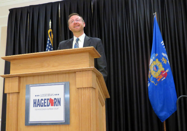 Wisconsin Supreme Court candidate Brian Hagedorn speaks at a news conference on Wednesday in Pewaukee. Hagedorn, a conservative, who was former Republican Gov. Scott Walker’s chief legal counsel for five years, led the liberal-backed Lisa Neubauer by 5,962 votes out of 1.2 million cast, in the Supreme Court election held on Tuesday, according to unofficial results. That is a difference of just under half a percentage point, close enough for Neubauer to request a recount. But she would have to pay for it. (AP Photo/Ivan Moreno)