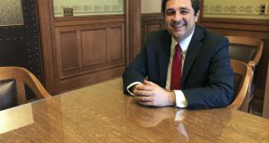 Attorney General Josh Kaul sits in his Capitol office conference room in Madison. During his four months in office, Kaul has shifted the state Justice Department away from his Republican predecessor's conservative stances by withdrawing the state from or changing its positions on a host of lawsuits. (AP Photo/Todd Richmond)