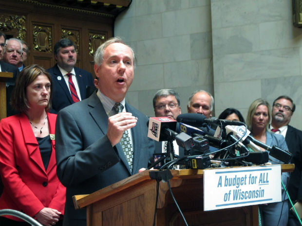 Assembly Speaker Robin Vos joins his fellow Republicans on Tuesday in the Assembly chambers before a planned vote to pass the GOP’s version of the state budget. Vos argues the budget is fiscally responsible, but Democrats argue it falls short in various ways. (AP Photo/Scott Bauer)
