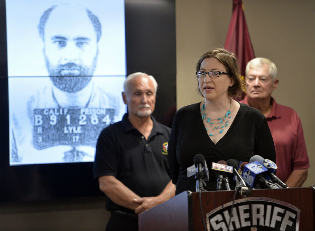 The Medical Examiner Patrice Hall, center, speaks during a press conference with retired Sheriff's Department detectives John Zielsdorf, left, and Larry LaPoint, right, on Wednesday in Kenosha The body of a John Doe homicide victim found in a shallow grave in southeastern Wisconsin more than 30 years ago now has been identified as Robert Lyle Schwartz. (Brian Passino/The Kenosha News via AP) 