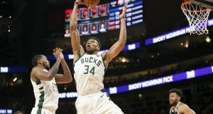 The Milwaukee Bucks forward Giannis Antetokounmpo grabs a rebound against the Atlanta Hawks in the second half of an NBA basketball game on Nov. 20 in Atlanta. Giannis is suing a home-remodeling contractor from Cedarburg, contending the contractor didn’t perform the work he was hired for. (AP Photo/Brett Davis)