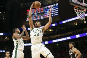 The Milwaukee Bucks forward Giannis Antetokounmpo grabs a rebound against the Atlanta Hawks in the second half of an NBA basketball game on Nov. 20 in Atlanta. Giannis is suing a home-remodeling contractor from Cedarburg, contending the contractor didn’t perform the work he was hired for. (AP Photo/Brett Davis)