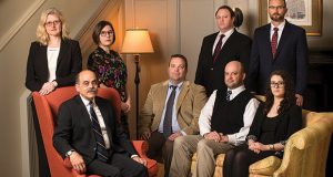 Members of the Kohner, Mann & Kailas legal team include (standing from left) Melinda Bialzik, Ellen Leopold, Ryan Billings and Lance Duroni, and (seated from left) Bob Gegios, Christopher Borman, Paul Daly and Abbey Bowen. The firm is entering its 13th year of litigation in a natural-gas antitrust lawsuit that was recently sent back to Wisconsin for trial.
