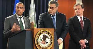 Detroit Police Chief James Craig,left, speaks beside U.S. Attorney General William Barr, and FBI Director Christopher Wray during the announcement of a  new national crime-reduction initiative, Wednesday, Dec. 18, 2019, in Detroit. (AP Photo/Corey Williams)