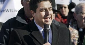 FILE - In this Nov. 7, 2019 file photo, Wisconsin Attorney General Josh Kaul speaks during a rally at the State Capitol in Madison, Wis. Kaul's first year in office was a mixed bag of big wins and frustrating defeats for the Democrat. (Steve Apps/Wisconsin State Journal via AP File)