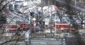 Milwaukee Police and Milwaukee Fire Dept. personnel respond to reports of an active shooting at the Molson Coors Brewing Co. campus in Milwaukee, Wednesday, Feb. 26, 2020. (Rick Wood/Milwaukee Journal-Sentinel via AP)