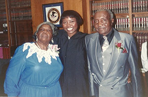Judge Maxine White (center) poses with her mother, Frankie Higgins White, and father, James White, at her judicial investiture in 1992. 